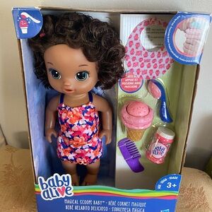 Baby Alive Magical Scoops Baby Doll in Floral Pink Swim Outfit